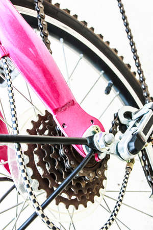 Bicycle gears and rear derailleur on concrete road backgroundの写真素材