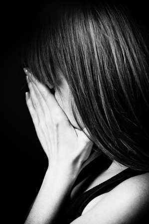Closeup portrait of depressed teenager girl の写真素材