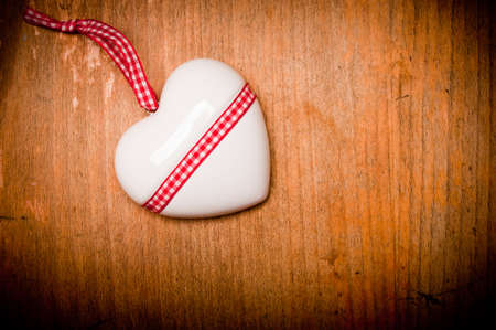 heart on woodの写真素材