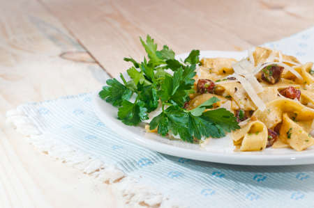 Spaghetti Carbonara with bacon, parsley and cheeseの写真素材