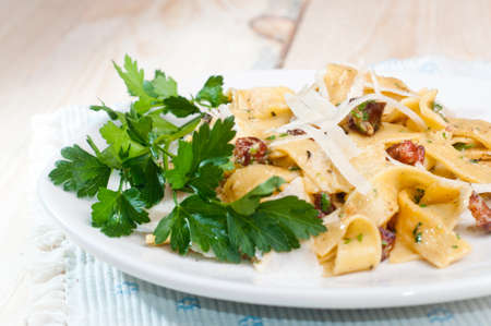 Spaghetti Carbonara with bacon, parsley and cheeseの写真素材
