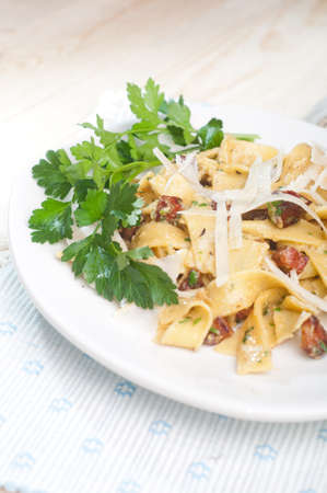 Spaghetti Carbonara with bacon, parsley and cheeseの写真素材