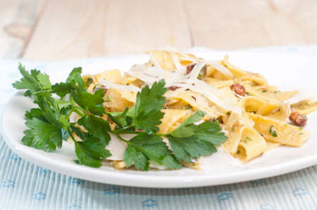 Spaghetti Carbonara with bacon, parsley and cheeseの写真素材