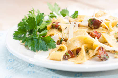 Spaghetti Carbonara with bacon, parsley and cheeseの写真素材
