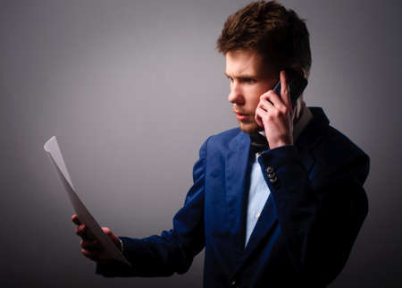 Businessman using a mobile phoneの写真素材