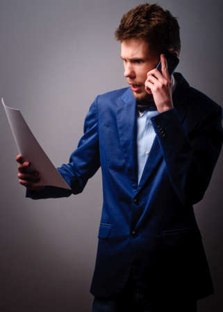 Businessman using a mobile phoneの写真素材