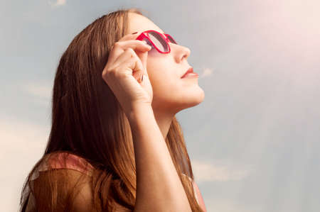 Summer portrait of a beautiful woman in sunglassesの写真素材