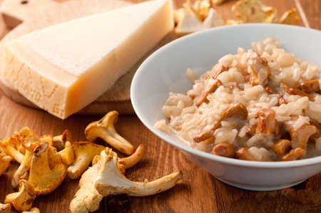 risotto with mushrooms on a wooden backgroundの写真素材