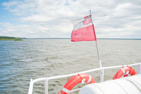 Polish flag on the background of skyの写真素材