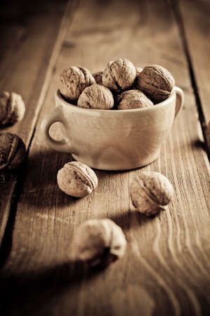 Walnuts on wooden boards. Vintage Retouch.の写真素材