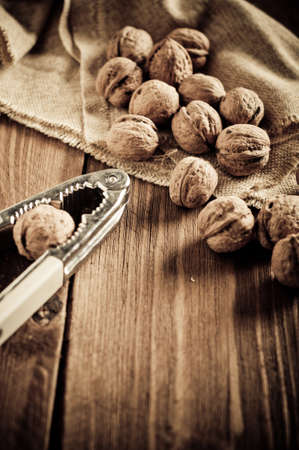 Walnuts on wooden boards. Vintage Retouch.の写真素材