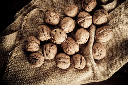 Walnuts on wooden boards. Vintage Retouch.の写真素材