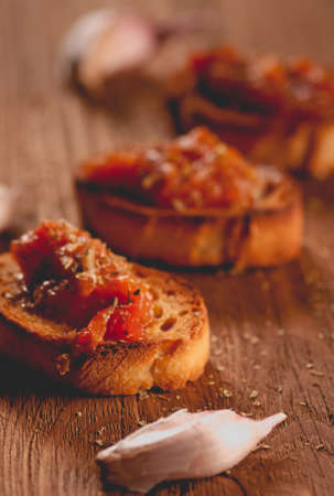 Toast with tomato sauce. Retouching in vintage style. selective focusの写真素材