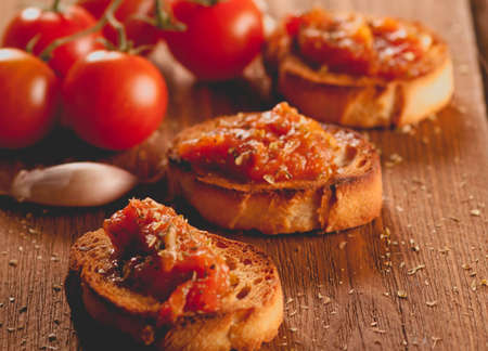 Toast with tomato sauce. Retouching in vintage style. selective focusの写真素材
