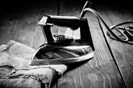 Old electric iron, touch-up in retro style. Black and White Photographyの写真素材