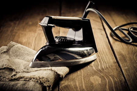 Old electric iron, touch-up in retro styleの写真素材