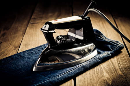 Old electric iron, touch-up in retro styleの写真素材