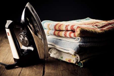 Old electric iron, touch-up in retro styleの写真素材