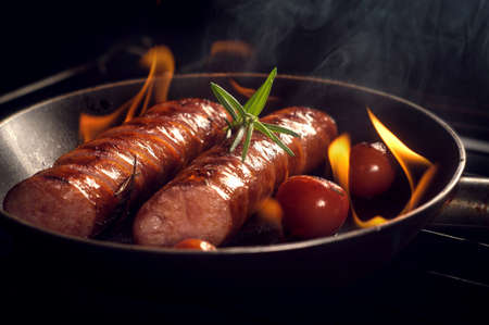 grilled sausage with cherry tomatoesの写真素材