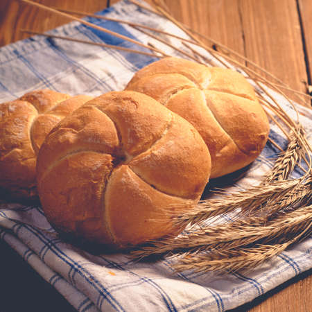 bread on wooden boards, touch-up in retro styleの写真素材