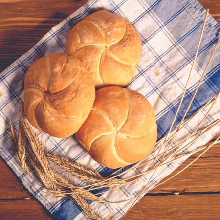 bread on wooden boards, touch-up in retro styleの写真素材