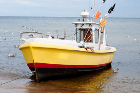 fishing boat on the beach, baltic seaの写真素材