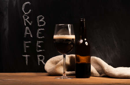 Dark craft beer id the glassの写真素材
