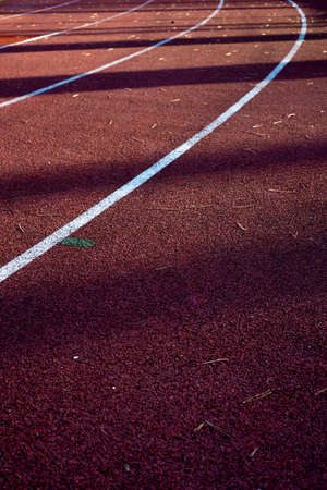 Athletics stadium running track, selective focus