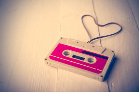 Audio cassette tape in the shape of heart. Retouching vintage.の写真素材