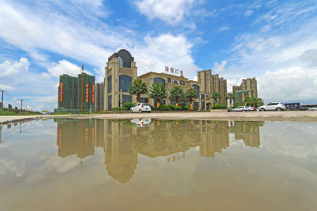 Haidong Plaza with reflection on the puddle of waterのeditorial素材