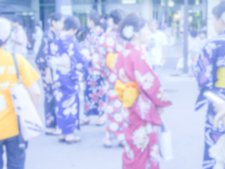 Defocused background of girls in Kimono, Japan. Intentionally blurred post production for bokeh effectの写真素材