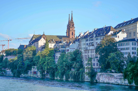 Cityscape of Basel with its famous red sandstone cathedral, Switzerlandのeditorial素材