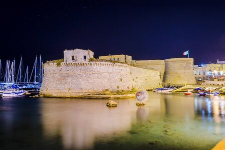 Scenic night view of the Angevine-Aragonese Castle in Gallipoli, Salento, Apulia, Italyのeditorial素材