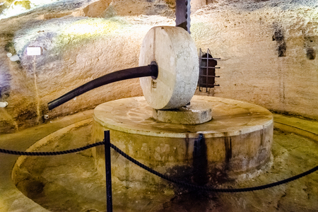 Disused ancient underground oil mill in Gallipoli, Salento, Apulia, Italyの写真素材