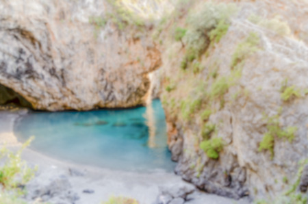 Defocused background of Arcomagno Beach on the Coast of the Cedars, Tyrrhenian Sea, South of Italy. Intentionally blurred post production for bokeh effectの写真素材