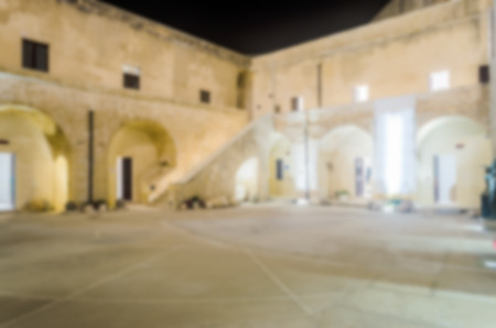 Defocused background of Inner Courtyard of the Otranto Castle, Salento, Italy. Intentionally blurred post production for bokeh effectのeditorial素材