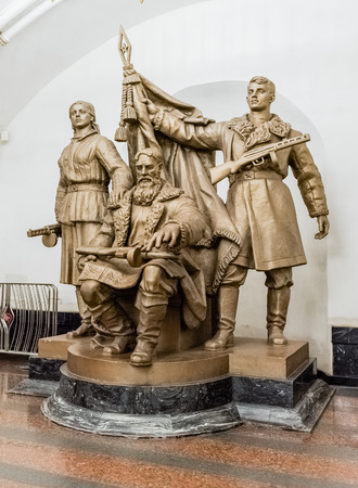 MOSCOW - AUGUST 22, 2016: Soldiers monument inside Belorusskaya subway station, Moscow, Russia. The station is on the Zamoskvoretskaya Line of the Moscow Metro and opened in 1938のeditorial素材