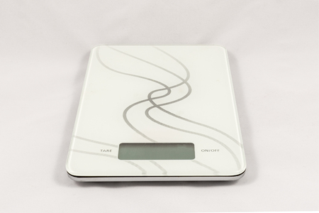 Gram digital kitchen scale, isolated on white backgroundの写真素材