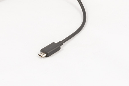 Black micro USB cable isolated on white background