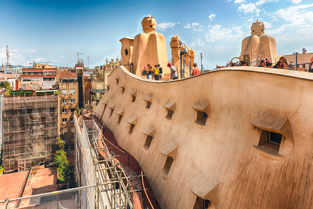 BARCELONA - AUGUST 9: The scenic architecture on the rooftop of Casa Mila, aka La Pedrera, designed by Antoni Gaudi and iconic landmark in Barcelona, Catalonia, Spain, on August 9, 2017のeditorial素材