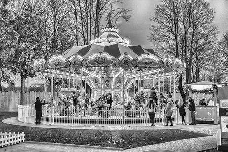ROME - JANUARY 1: An old fashioned carousel at dusk inside the Luneur amusement park in Rome, January 1, 2017のeditorial素材