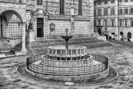 View of Fontana Maggiore, monumental medieval fountain located between the cathedral and the Palazzo dei Priori in the city of Perugia, Italyのeditorial素材