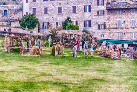 ASSISI, ITALY - JANUARY 14: Life size Nativity scene outside the Basilica of Saint Francis, Assisi, Italy, January 14, 2018. The Church has been declared UNESCO World Heritage Site since 2000のeditorial素材