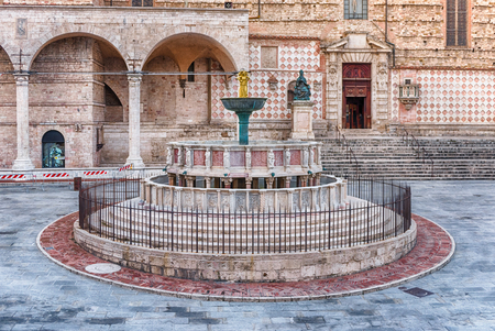 View of Fontana Maggiore, monumental medieval fountain located between the cathedral and the Palazzo dei Priori in the city of Perugia, Italyの写真素材