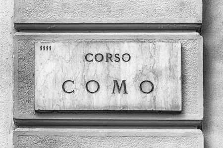 Street sign for Corso Como, iconic pedestrian street and heart of the nightlife scene in Milan, Italyのeditorial素材