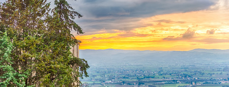 Scenic sunset as seen from Assisi, on the western flank of Monte Subasio, Italyの写真素材