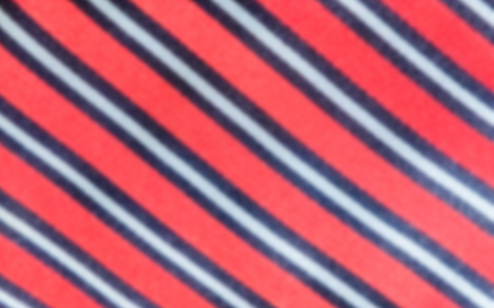 Defocused background of a necktie texture. Intentionally blurred post production for bokeh effect