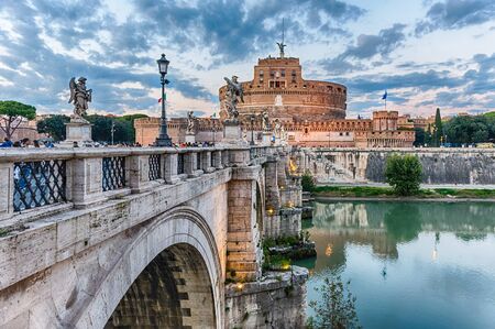 ROME - NOVEMBER 18:  Tourists walking by Sant'Angelo Bridge in Rome, Italy, November 18, 2018. Castel Sant'Angelo, aka Mausoleum of Hadrian, was used in the middle ages as a fortress and a castle by the popesのeditorial素材