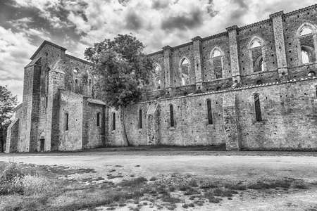 CHIUSDINO, ITALY - JUNE 22: Exterior view of the iconic Abbey of San Galgano, a Cistercian Monastery...
