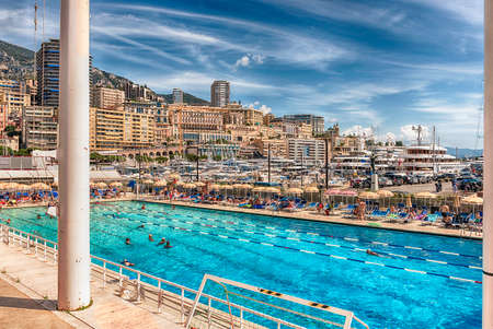 MONTE CARLO, MONACO - AUGUST 13: View over the Stade Nautique Rainier III swimming pool in Monte Carlo, Cote d'Azur, Monaco, iconic landmark of the French Riviera, as seen on August 13, 2019のeditorial素材